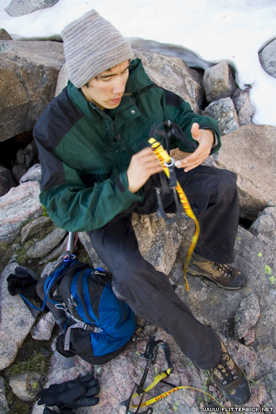 Pat stops to put his crampons on before beginning his ascent of Peak Q