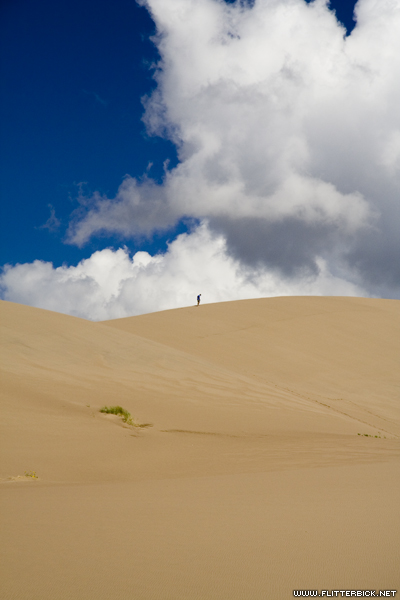 A lone hiker in Great Sand Dunes National Park