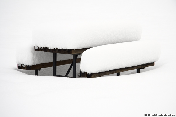 Snowed-in picnic table on the grounds of the Albuquerque Academy
